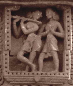 Click on photo of Odissi flautist sculpture to see more Orissi sculptures. Photo © 1998, David J. Capers
